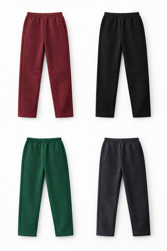 Four pairs of pants in red, black, green, and gray on a white background